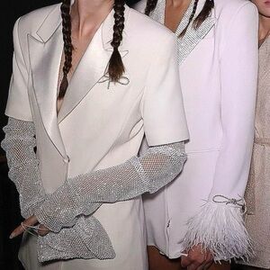 white blazer with crystal bows